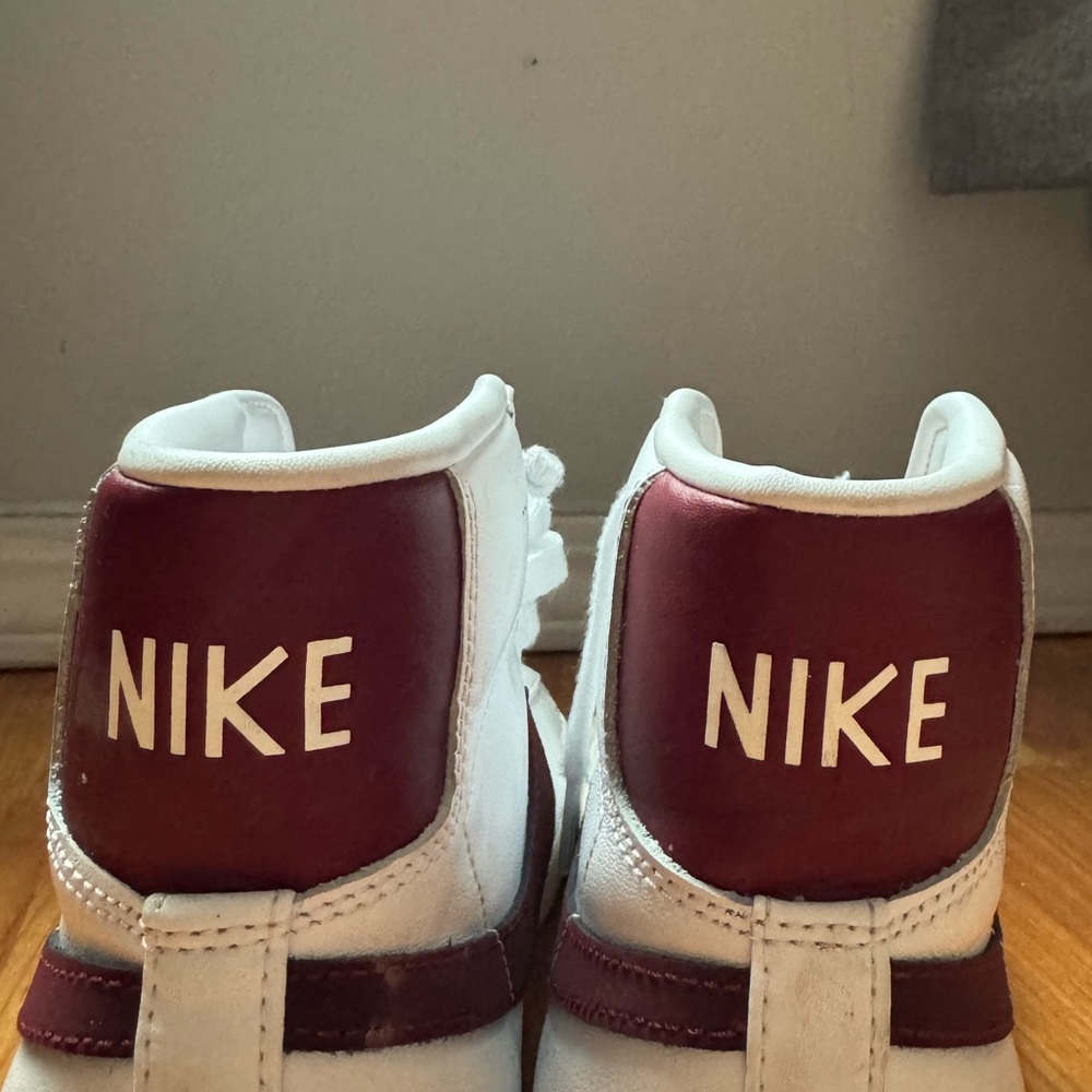 Nike Blazers. Maroon color. They are in good condition. Size 9.5 in Women’s
